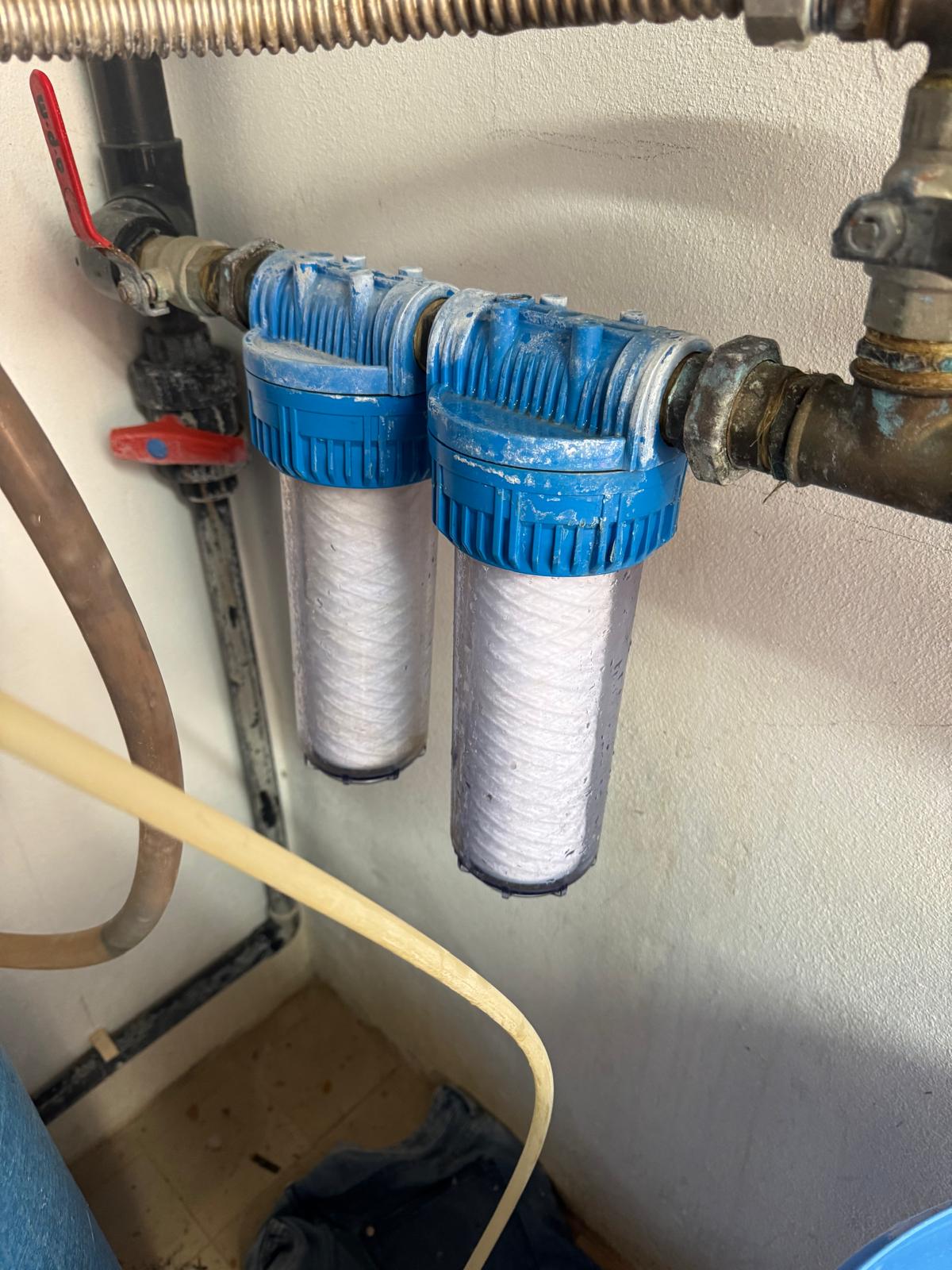 New water filter setup installed on pipework